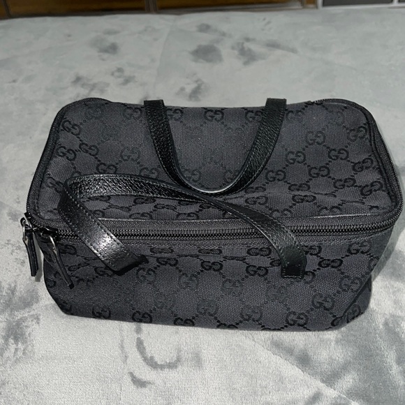 Gucci Accessories - Gucci cosmetics pouch excellent condition black